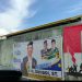 Spanduk kampanye Bacaleg Nasdem Terpasang DiTembok Sekolah